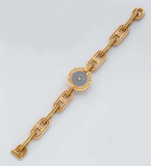 MONTRE BRACELET DE DAME EN OR, PAR HERMES