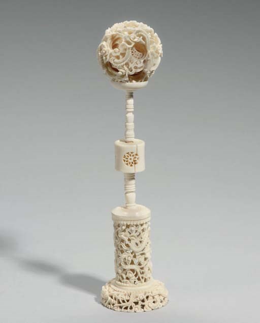 A Chinese ivory puzzle ball on stand, 19th century