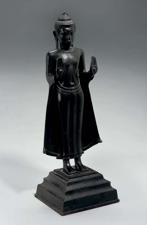 A Khmer style bronze figure of Buddha Sakyamuni, 19th Century or earlier