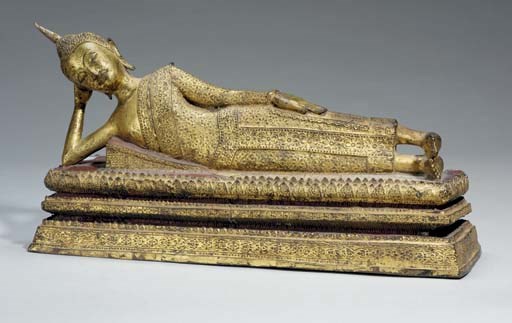 A large Thai gilt bronze model of sleeping Buddha, 19th century