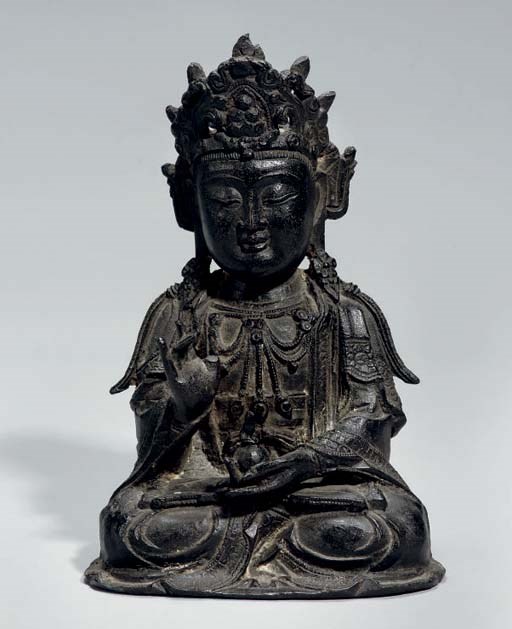 A Chinese bronze seated figure of Buddha, 16th 17th century