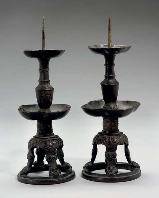 A pair of Chinese bronze pricket sticks, 16th/17th Century