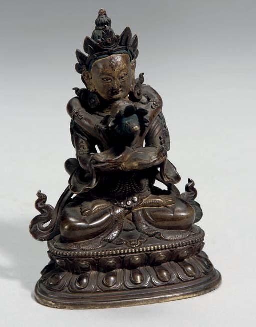 A Tibetan parcel-gilt bronze model of Sitsamvara in Yabyum, 18th/19th Century