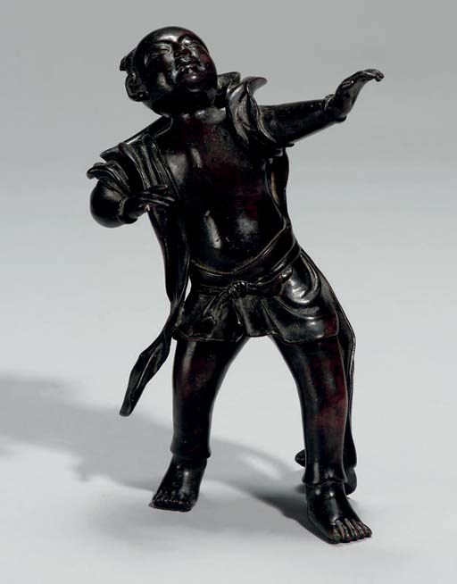 A Bronze figure of a Chinese boy, 17th Century