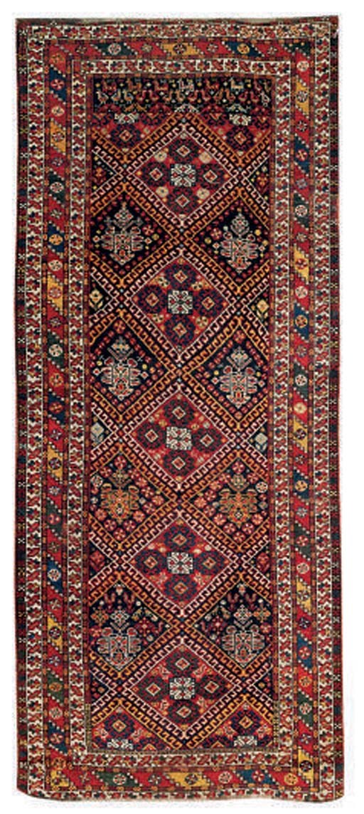 An antique Neriz long rug