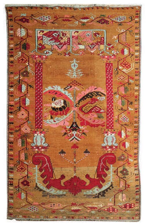 An antique Ghiordes prayer rug and Malayir rug