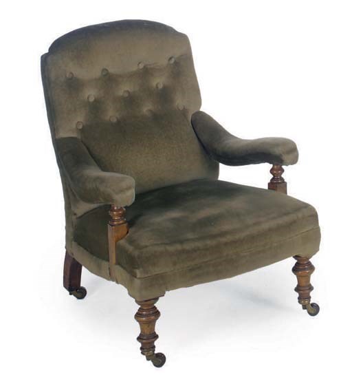 A LATE VICTORIAN WALNUT ARMCHAIR