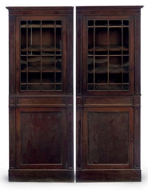 A PAIR OF MAHOGANY BOOKCASES