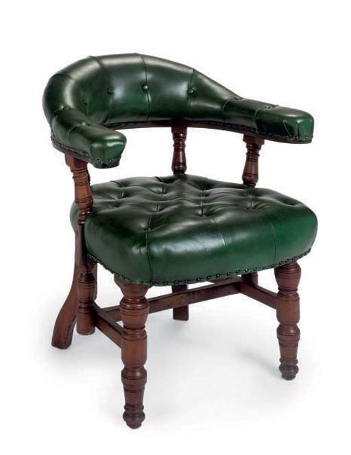 A LATE VICTORIAN LEATHER UPHOLSTERED WALNUT DESK CHAIR