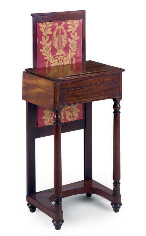 A LATE REGENCY MAHOGANY READING TABLE