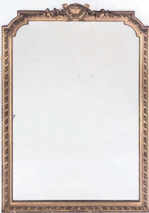 A FRENCH GILT COMPOSITION OVERMANTEL MIRROR