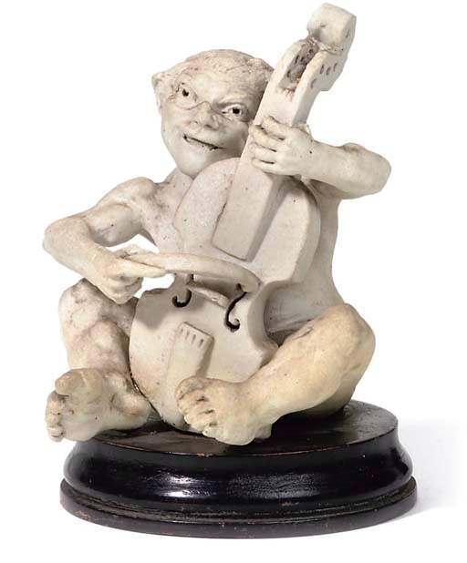 MARTIN BROTHERS; IMP MUSICIAN PLAYING A CELLO