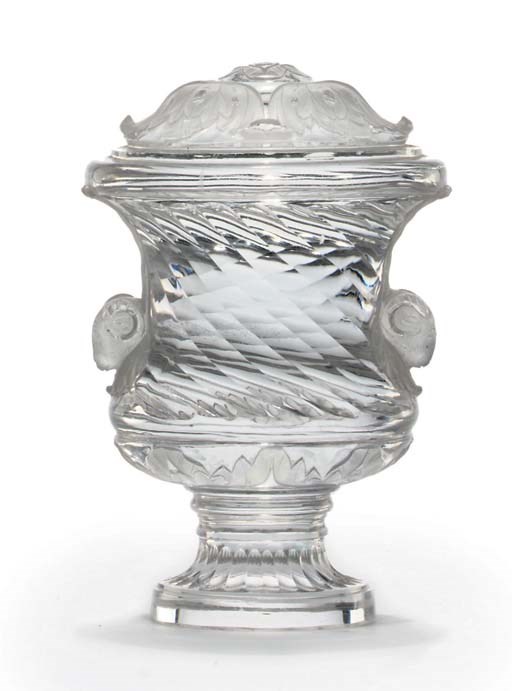 A CARVED ROCK CRYSTAL URN