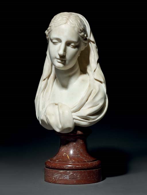 A CARVED MARBLE BUST OF THE VIRGIN