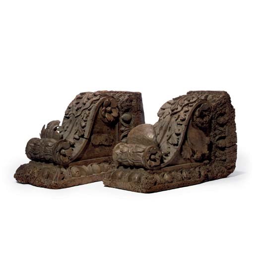 A PAIR OF CARVED WOOD BRACKETS