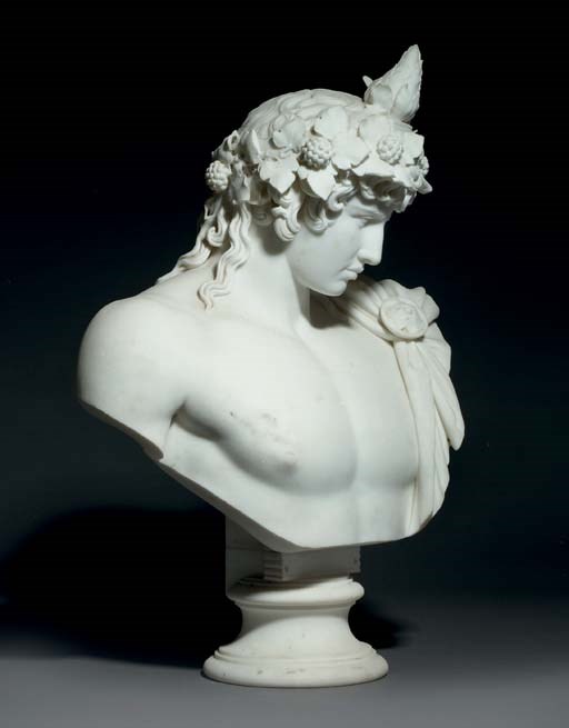 A CARVED MARBLE BUST OF ANTINOUS AS DIONYSOS-OSIRIS