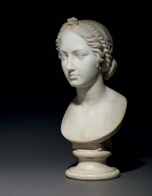 A CARVED MARBLE BUST OF A WOMAN