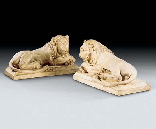 A PAIR OF TERRACOTTA LIONS