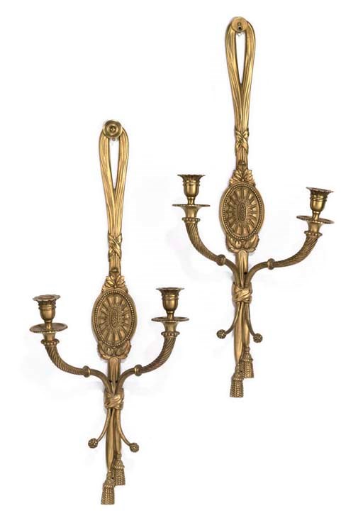 A SET OF THREE GILT-BRONZE TWIN-LIGHT WALL APPLIQUES