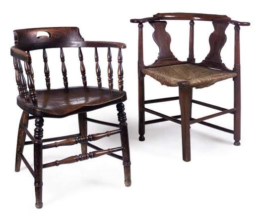 A GEORGE III OAK AND ELM CORNER ARMCHAIR