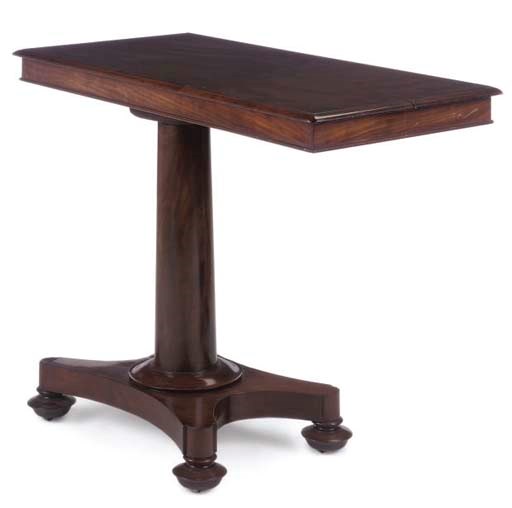 AN EARLY VICTORIAN MAHOGANY READING TABLE