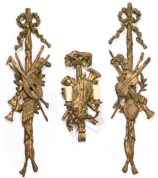 A PAIR OF ITALIAN CARVED GILTWOOD WALL TROPHIES