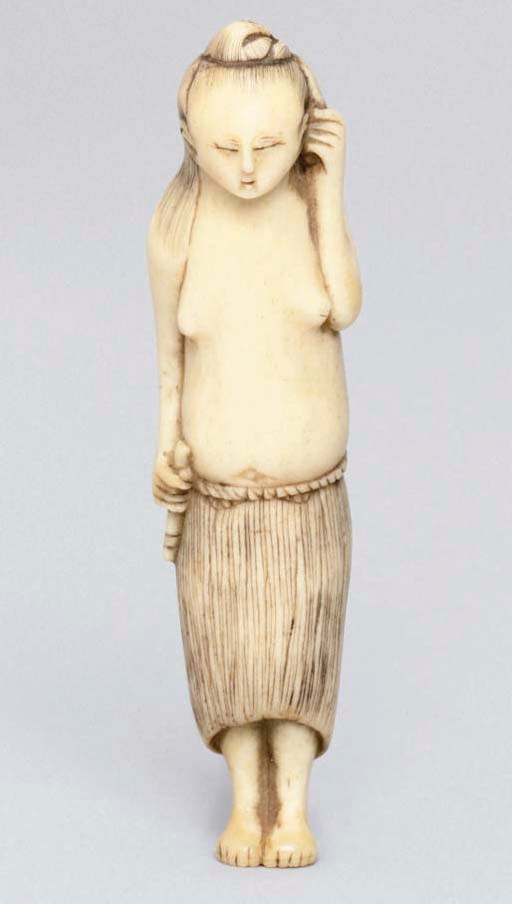 A Japanese bone netsuke of a fishergirl, 19th Century