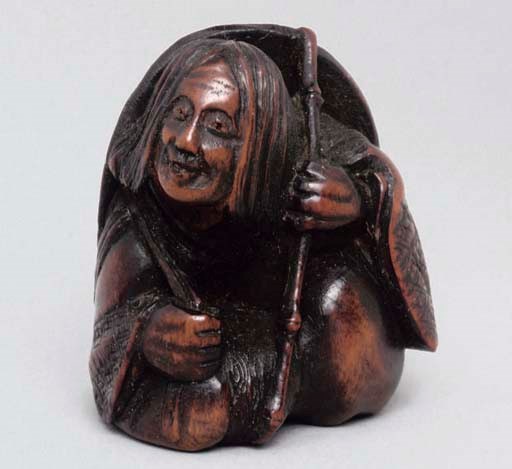 A Japanese wood netsuke of Ono-no-Komachi, signed Unkoku, 19th Century