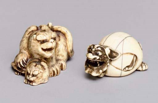 A Japanese ivory netsuke of a lion and cub, 19th Century