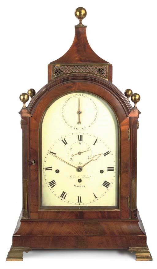 A GEORGE III MAHOGANY AND BRASS-MOUNTED QUARTER CHIMING EIGHT DAY TABLE CLOCK