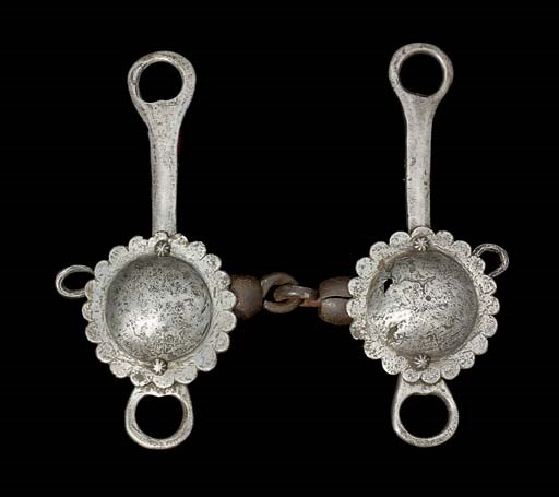 A GERMAN CURB BIT, IN 16TH CENTURY STYLE; AND A EUROPEAN SET OF HORSE REINS