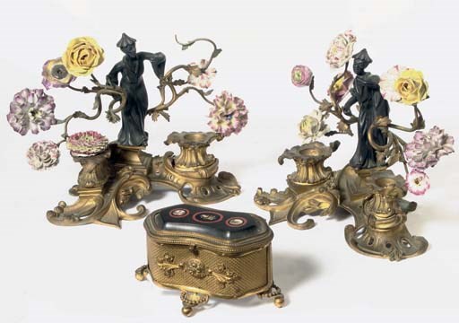 A PAIR OF FRENCH PORCELAIN-MOUNTED ORMOLU AND PATINATED BRONZE FIGURAL CANDELABRA