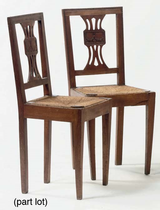 A SET OF FOUR NORTH-ITALIAN WALNUT SIDE CHAIRS