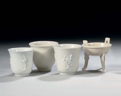 Three Chinese blanc-de-chine cups and a censer