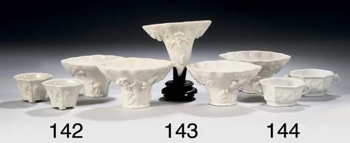 Two pairs of Chinese blanc-de-chine cups