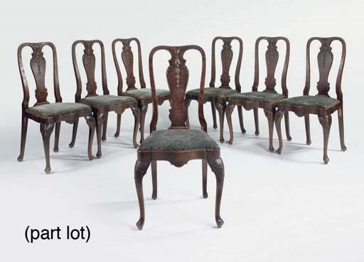 A SET OF EIGHTEEN DUTCH WALNUT AND BURR-WALNUT DINNING CHAIRS