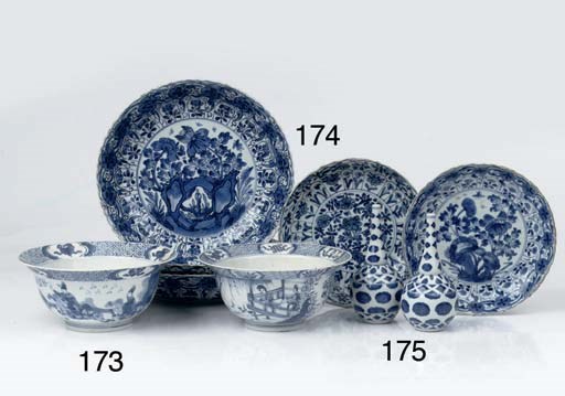 A set of three and a set of two Chinese blue and white moulded saucer dishes