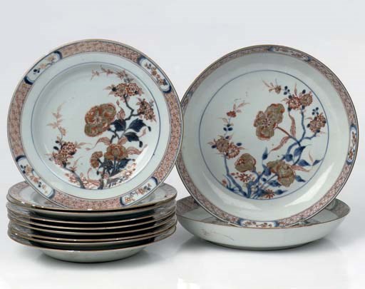 A set of nine Chinese Imari plates and a pair of saucer dishes