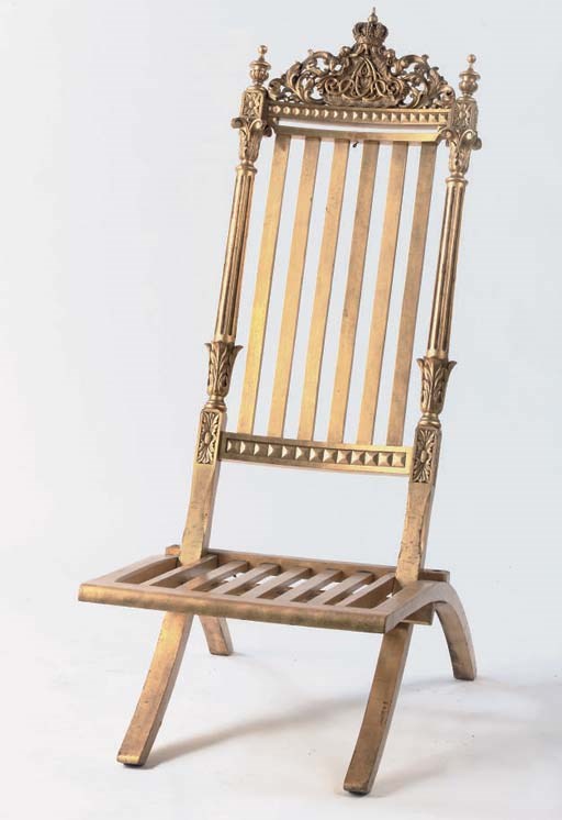 A NORTH EUROPEAN GILTWOOD FOLDING CHAIR