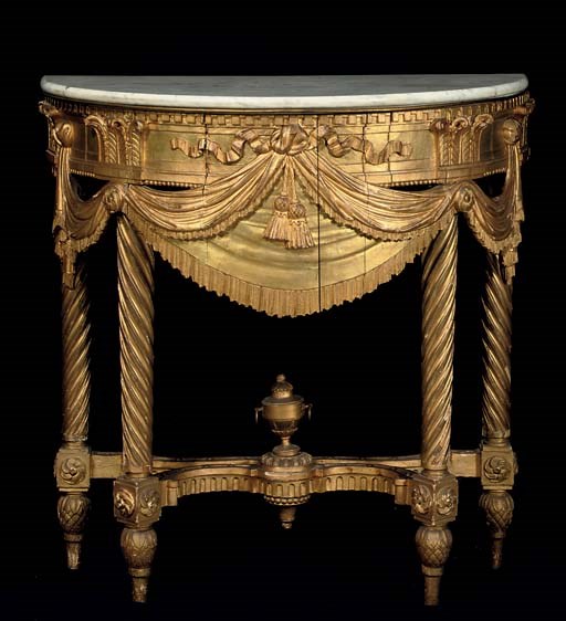 AN ITALIAN GILTWOOD CONSOLE TABLE