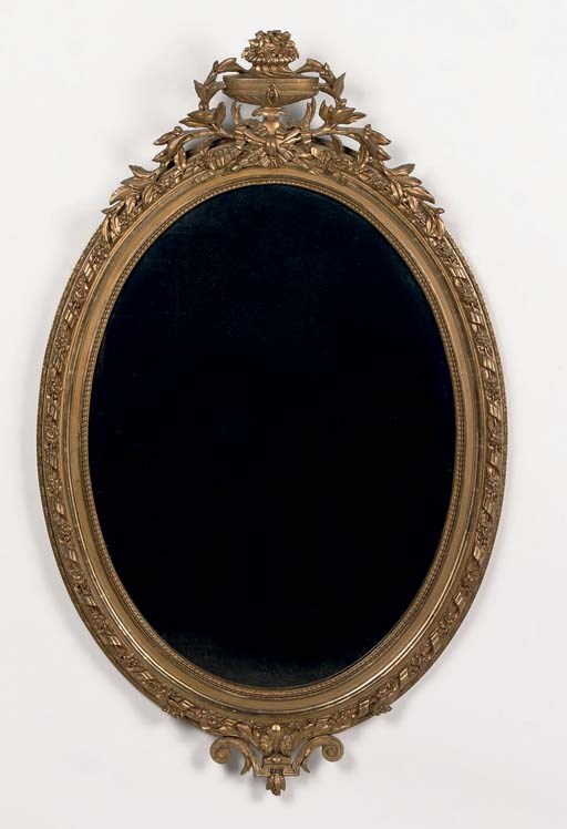 A NAPOLEON III CARVED WOOD AND GILT-GESSO MIRROR