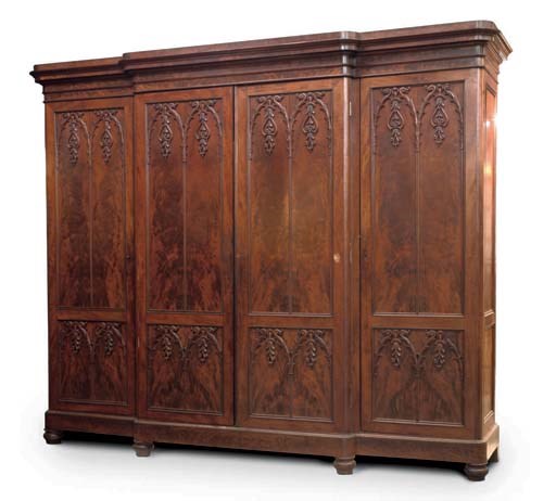 A DUTCH MAHOGANY BREAKFRONT WARDROBE