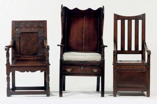 TWO ENGLISH OAK HIGHBACK ARMCHAIRS AND AN ENGLISH OAK WINGED HIGHBACK ARMCHAIR