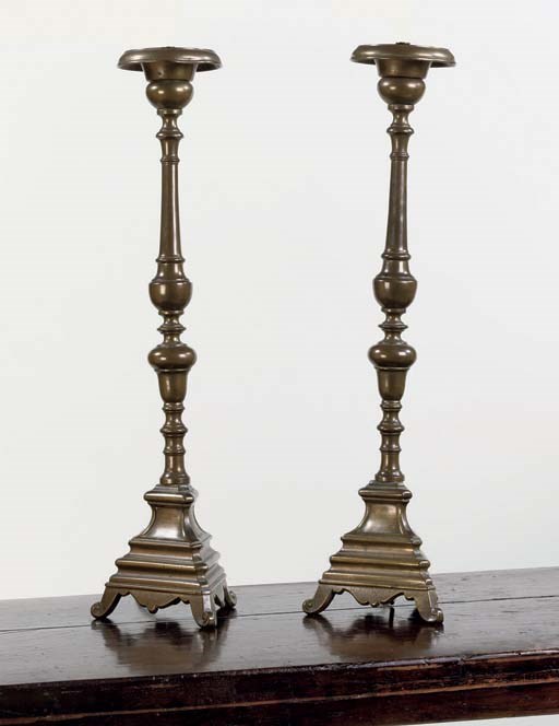 A PAIR OF FRENCH BRONZE CANDLESTICKS NOW MOUNTED AS TABLE LAMPS