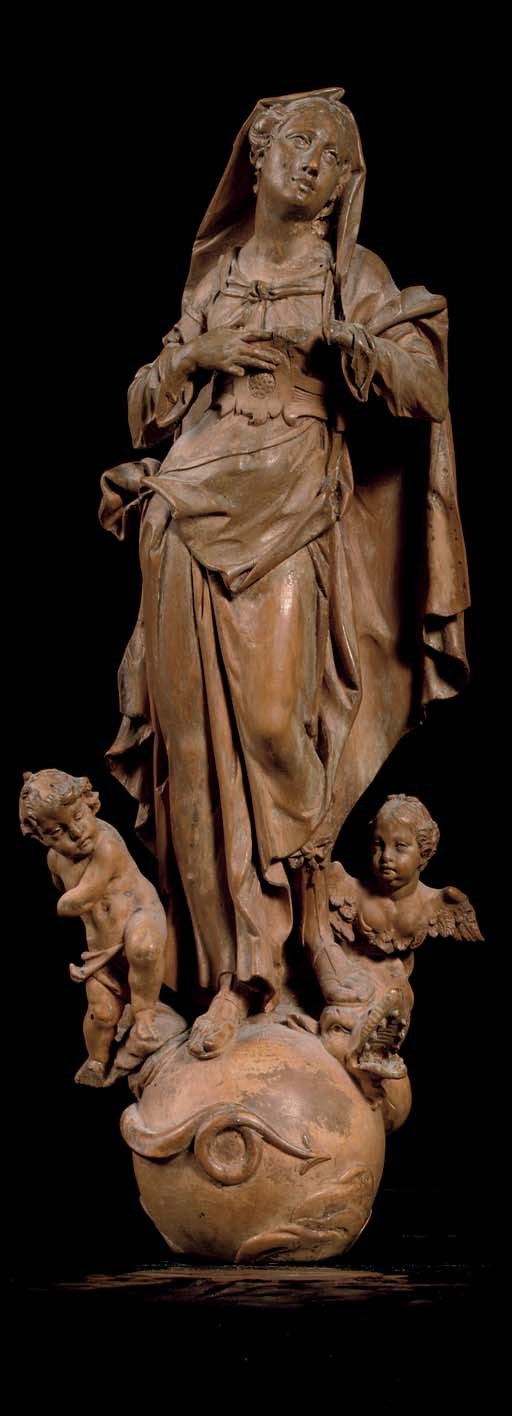A CARVED LIMEWOOD FIGURE OF THE MADONNA IMMACULATA
