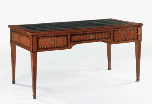 A FRENCH GILT-BRONZE MOUNTED TULIPWOOD AND FRUITWOOD BUREAU PLAT