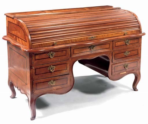 AN AUSTRIAN ORMOLU MOUNTED CHERRYWOOD AND ROSEWOOD CYLINDER BUREAU