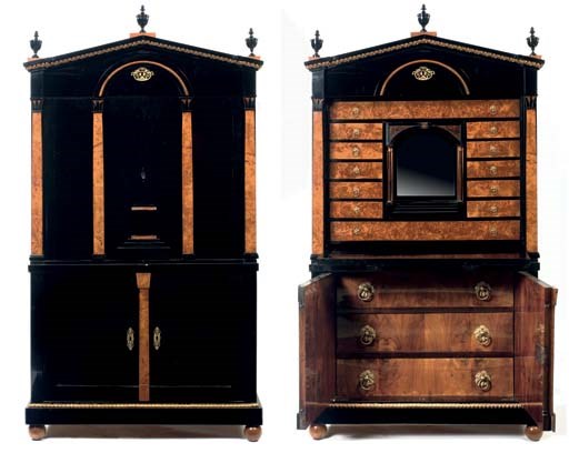 AN AUSTRIAN BIEDERMEIER EBONIZED, BURR-BIRCH AND PARCEL-GILT SECRETAIRE A ABATTANT
