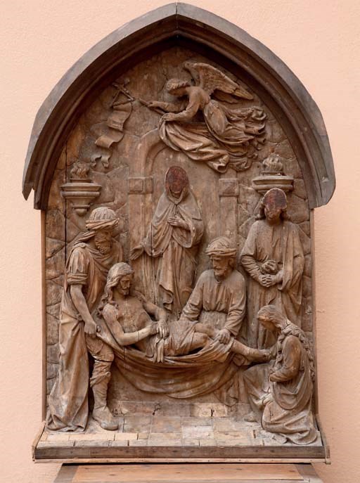A CARVED LIMEWOOD RELIEF OF THE DEPOSTION OF CHRIST