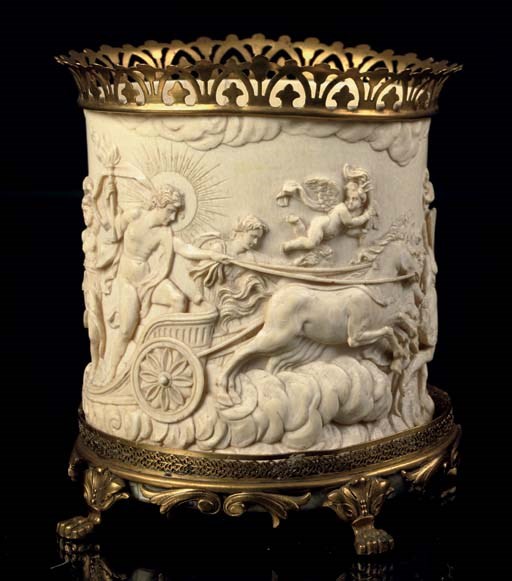 AN ORMOLU-MOUNTED RELIEF CARVED TANKARD DEPICTING APOLLO ON HIS CHARIOT